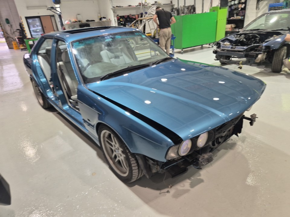Bodywork in progress on a vehicle at Alfa Body Works