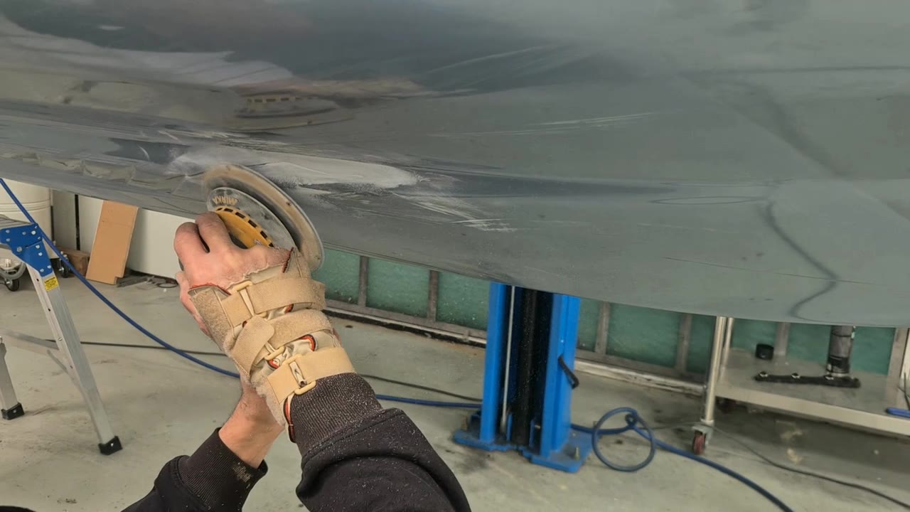 Jet-ski hull being sanded at Alfa Body Works in Frankston